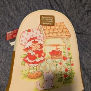 Loungefly Cream and Brown Backpack with Strawberry Shortcake Design